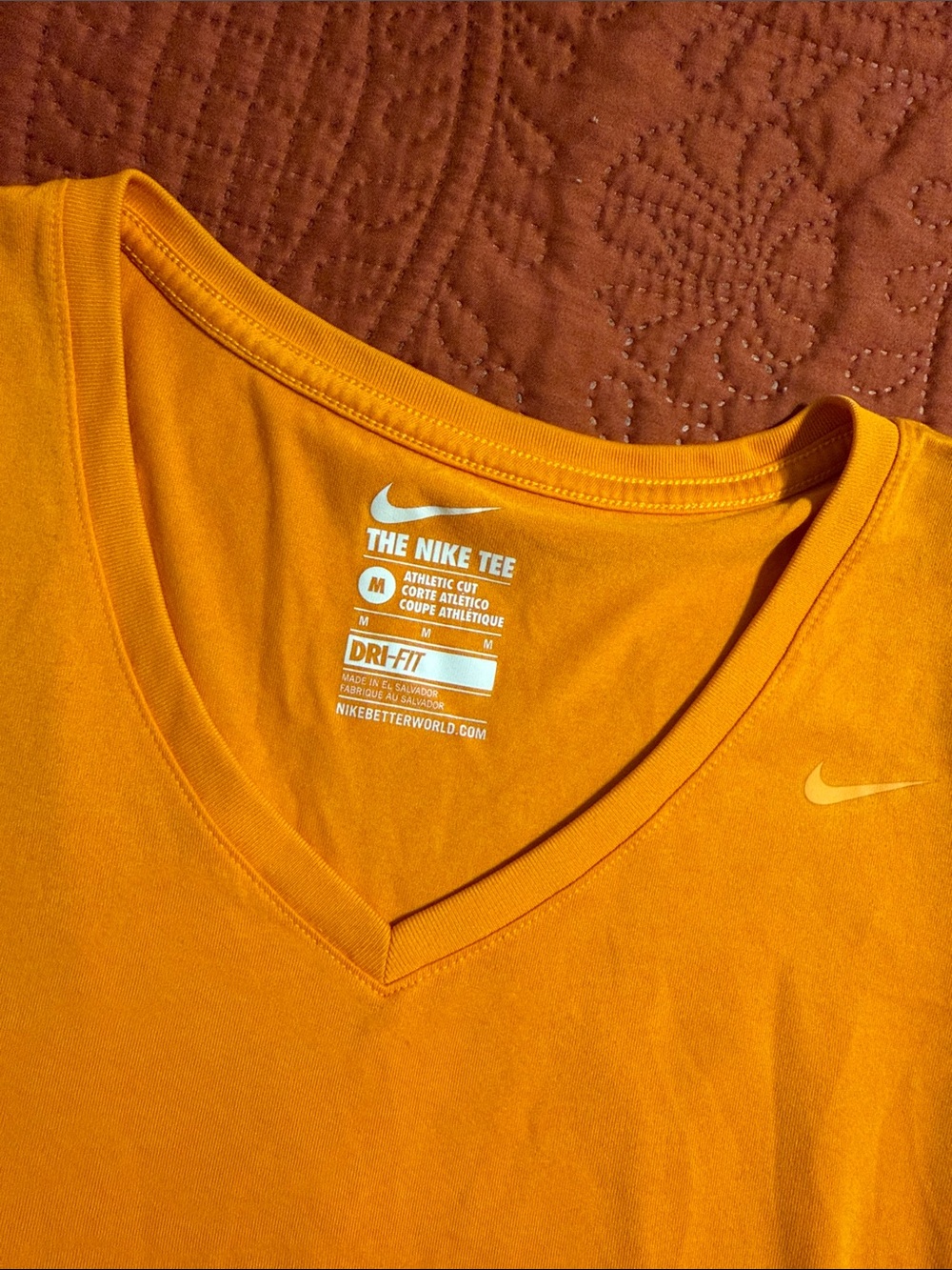 Nike Dri-FIT V-Neck Tee in Orange